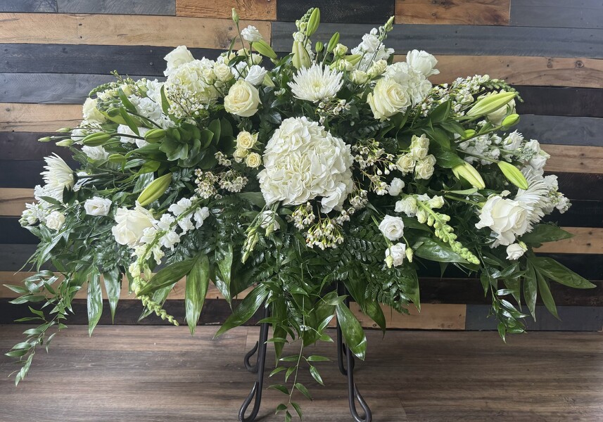 Pure Essence Casket Spray from Roxie's Florist in Burlington, NC